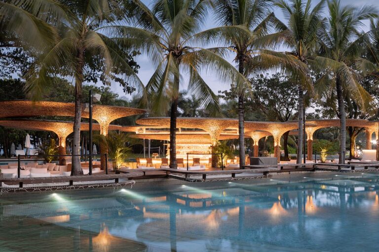 Synthetic woven bamboo canopy over a pool terrace